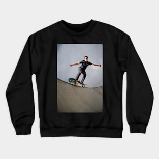 Skateboarder doing a grind Crewneck Sweatshirt